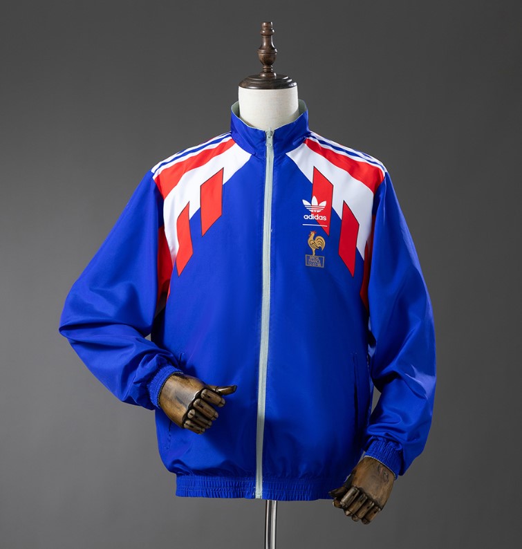Frankreich Wende-Regenjacke