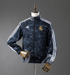 Real Madrid Wende-Regenjacke