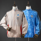 Manchester United Wende-Regenjacke 2025/26